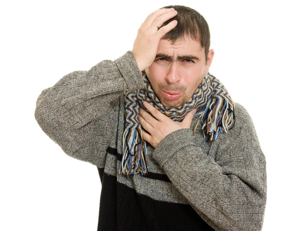 Sick man wearing a scarf on a white background. — Stock Photo, Image