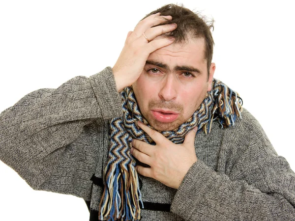 Sick man wearing a scarf on a white background. — Stock Photo, Image