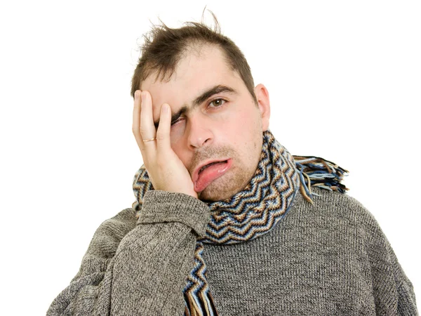 Uomo malato indossa una sciarpa su uno sfondo bianco . — Foto Stock