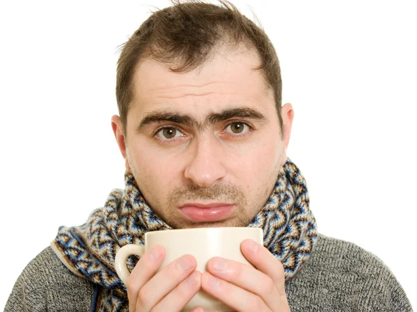 Ein geduldiger Mann mit einer Tasse auf weißem Hintergrund. — Stockfoto