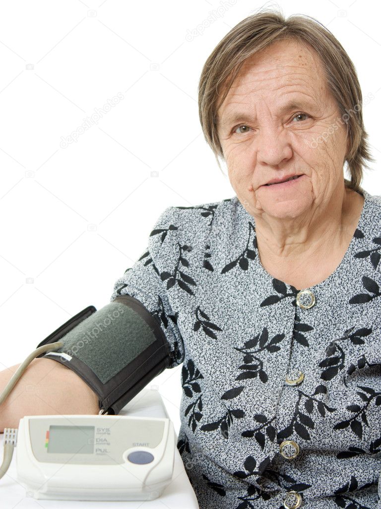 An elderly woman with a sphygmomanometer on a white background.