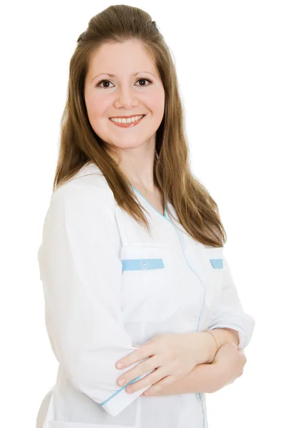 Vrouwelijke arts glimlachen op witte achtergrond. — Stockfoto