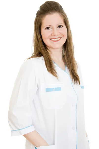 Médica sorrindo no fundo branco . — Fotografia de Stock