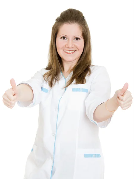 Kobieta lekarz pokazuje dobrze z uśmiechem na białym tle. — Zdjęcie stockowe