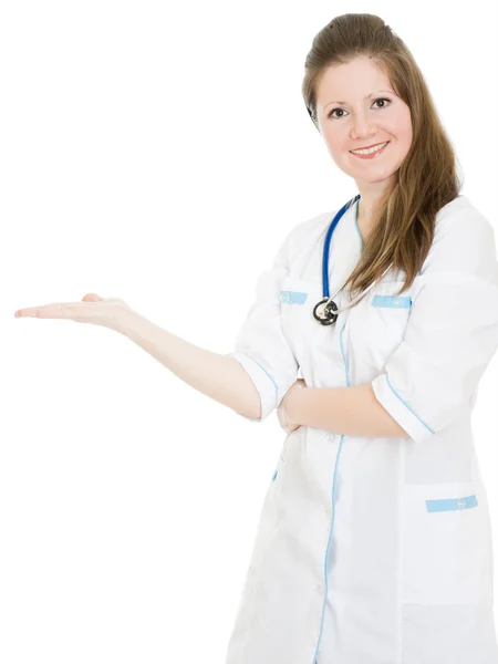Női orvos mutatja a lapjait, egy fehér háttér. — Stock Fotó