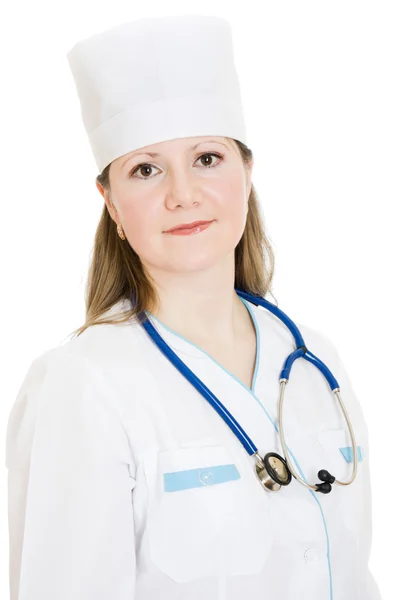 Médica com estetoscópio sobre fundo branco . — Fotografia de Stock