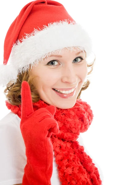 Feliz Natal mulher aponta um dedo para cima em um fundo branco . — Fotografia de Stock