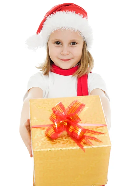 Beyaz zemin üzerinde bir kutu ile mutlu bir Noel çocuk. Telifsiz Stok Fotoğraflar