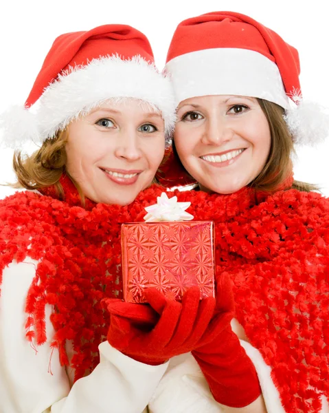 Дві жінки з різдвяними подарунками на білому тлі . — стокове фото