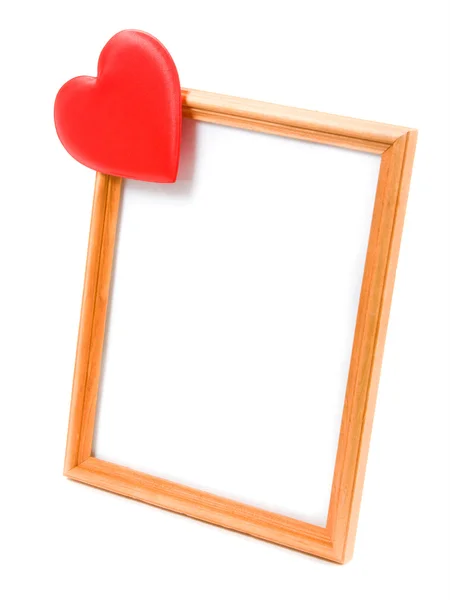 El corazón del marco sobre un fondo blanco . — Foto de Stock