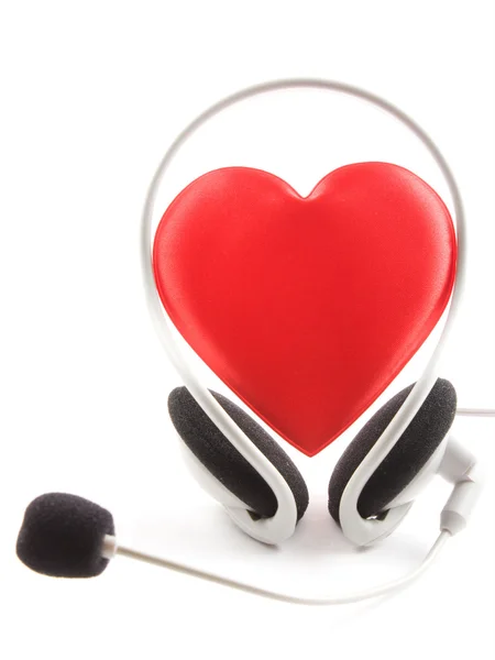 Heart headphones and a microphone on a white background. — Stock Photo, Image