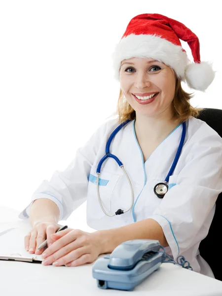 stock image A woman doctor meets Christmas in the workplace.