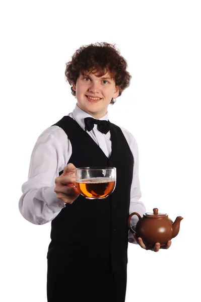 Waiter with brown ceramic teapot and big cup — Stock Photo, Image