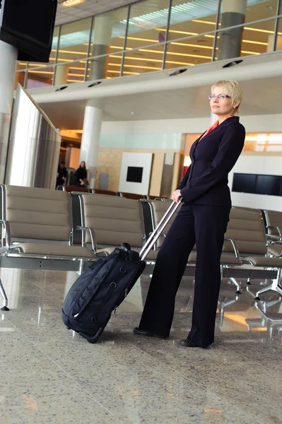 Businesswoman with luggage — Stock Photo, Image