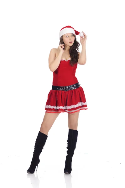 Tonåring tjej poserar i röd jul kläder — Stockfoto