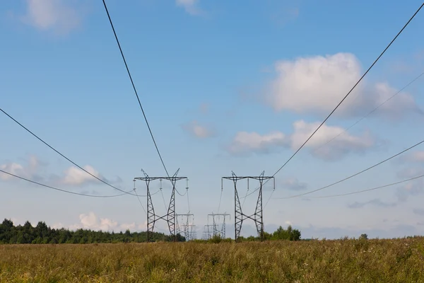 Electric main in countryside — Stock Photo, Image