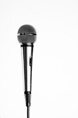 Silver microphone with black wire isolated on white clipart