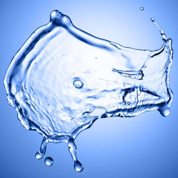 Salpicadura de agua sobre fondo azul —  Fotos de Stock