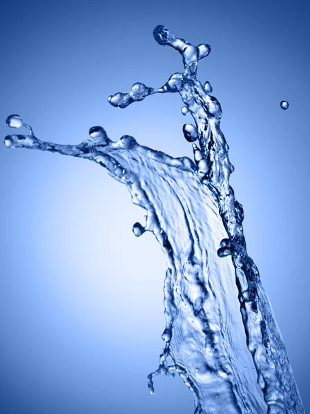 Voda splash na modrém pozadí — Stock fotografie