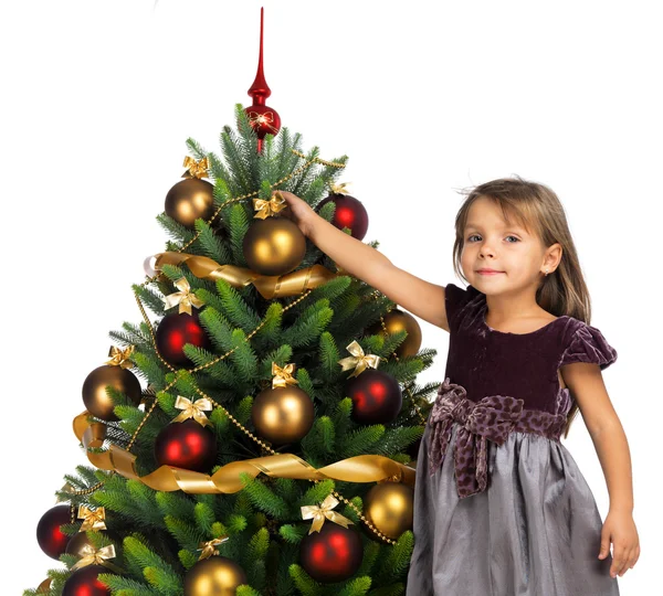 Chica bonita con regalo cerca del árbol de Navidad —  Fotos de Stock