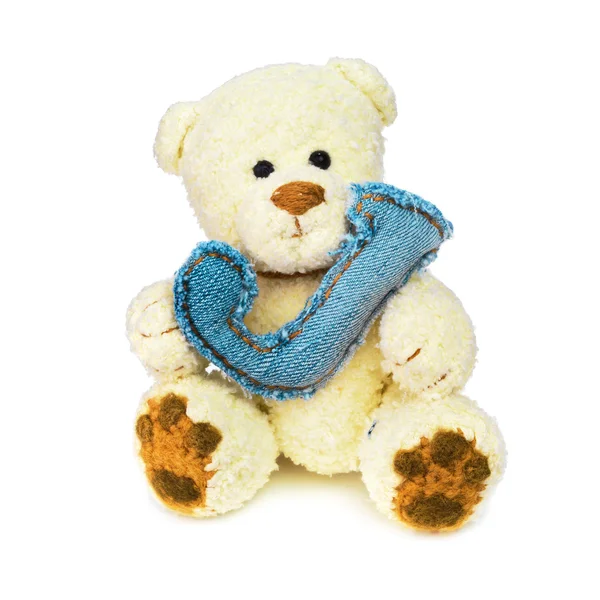 Teddy bear with one letter of jeans alphabet — Stockfoto