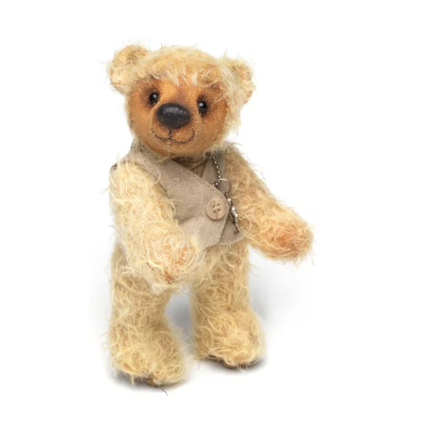 Teddy bear in classic vintage style isolated on white background Stock Photo