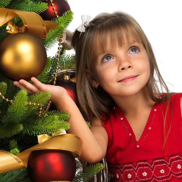 Hezká dívka v blízkosti stromu cristmas Stock Snímky