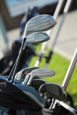 Golf clubs in golfbag clipart