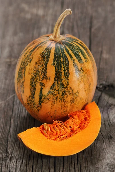 Pumpkin on the wooden background — Stock Photo, Image