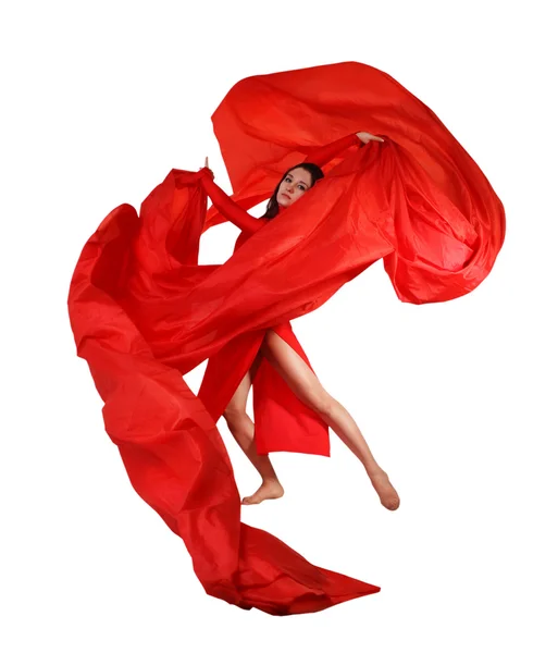 Junge Frau mit rotem Stoff über weißem — Stockfoto