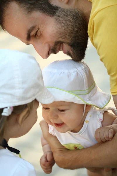 Happy young father with little daughters — Stock Photo, Image