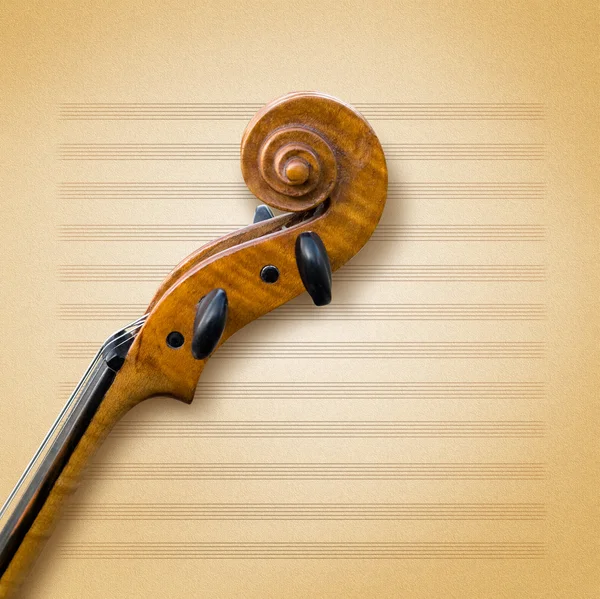 Old violin on a sheet of paper — Stock Photo, Image