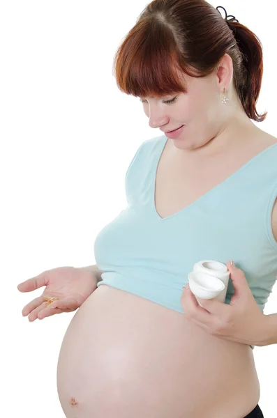 Kobieta w ciąży z taśmy pomiarowe — Zdjęcie stockowe