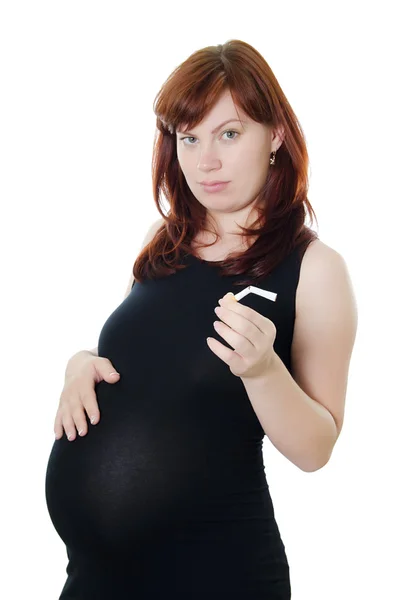 A mulher grávida quebra um cigarro — Fotografia de Stock