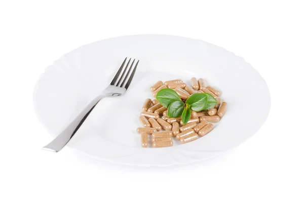 Pills in a plate — Stock Photo, Image