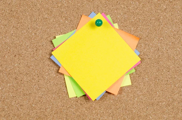 Collection of note papers on corkboard — Stock Photo, Image