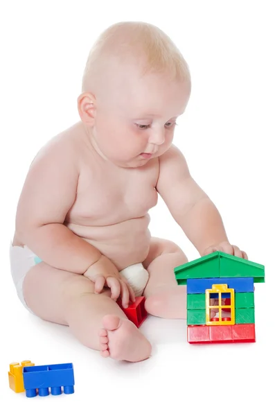 O bebezinho joga brinquedos — Fotografia de Stock