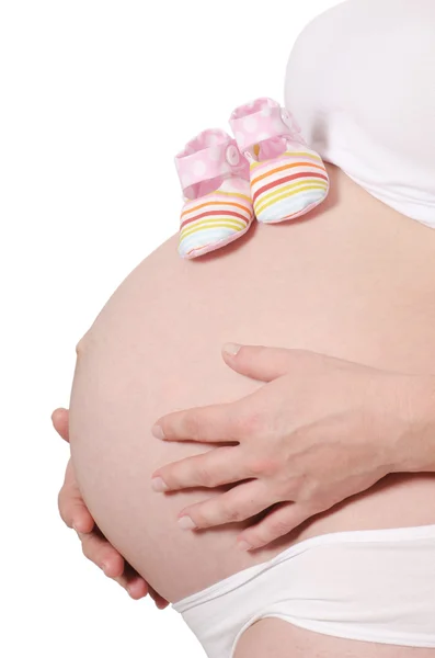 Беременная женщина с красивым животом — стоковое фото
