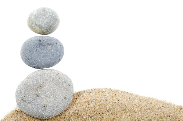 Stenar på sand — Stockfoto