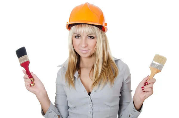 Bella ragazza in un casco da costruzione — Foto Stock