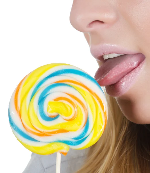 A menina com um doce de açúcar — Fotografia de Stock