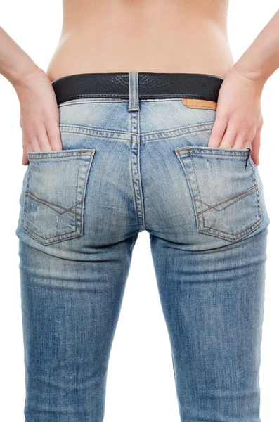 Het meisje in spijkerbroek — Stockfoto