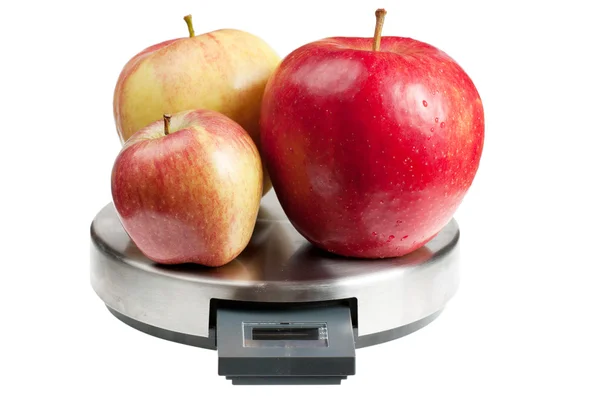 Яблоки на весах — стоковое фото