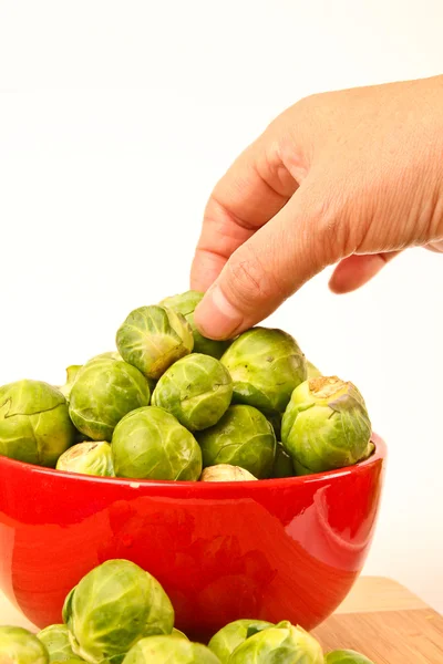 Fresh Brussels sprouts in a bowl — Stock Photo, Image