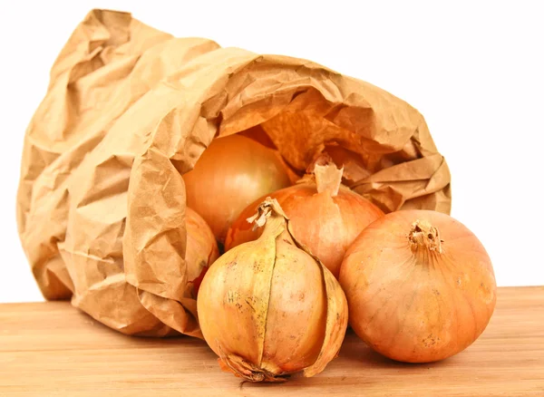 Stock image Fresh onion in a brown paperbag