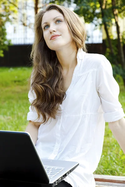 Pretty girl with laptop Stock Photo