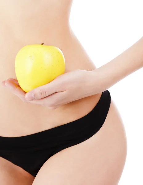 Corpo feminino e maçã — Fotografia de Stock