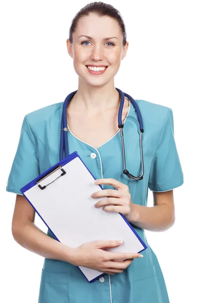 Pretty female doctor or nurse with clipboard Stock Photo