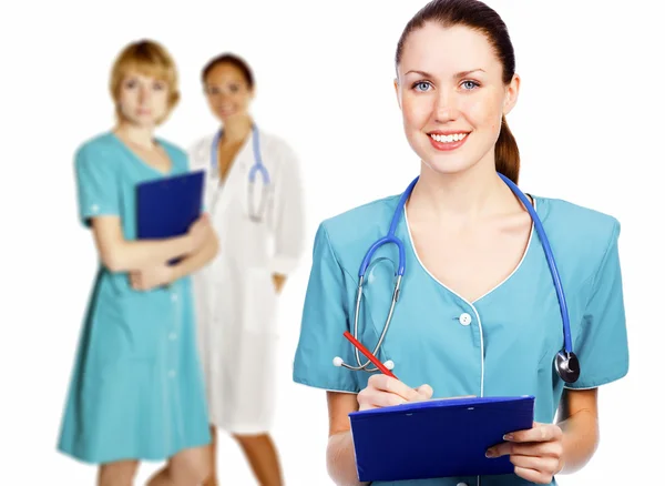 Attractive Caucasian Doctor and Team — Stock Photo, Image
