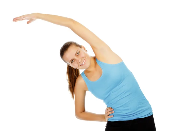 Piękne sportowe kobieta robi energii ćwiczeń fitness — Zdjęcie stockowe